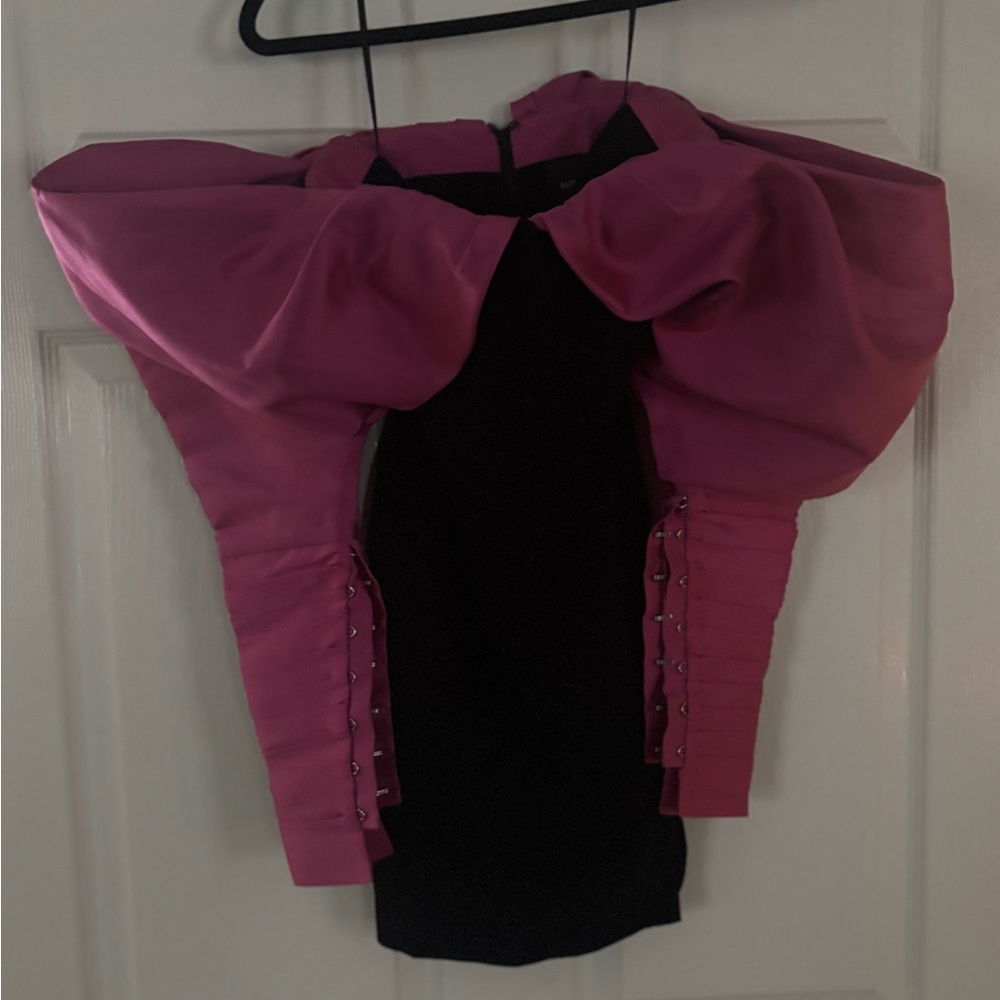 Never been worn but no tags. Beautiful on for a fun night or winter formal.